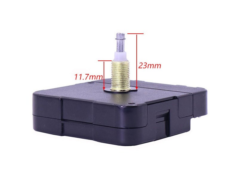 May include: A black clock movement with a silver and gold shaft. The movement measures 11.7 mm wide and 23 mm tall.