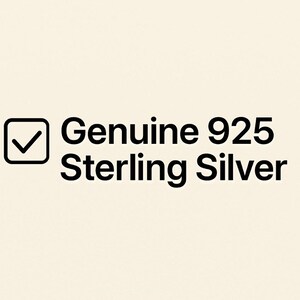 May include: The image displays the text "Genuine 925 Sterling Silver" in black, with a tick inside a square box. The background is a plain, light beige colour. The text indicates the product is made of sterling silver.
