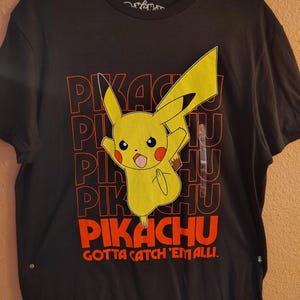 Maglietta da uomo con licenza ufficiale del gioco Nintendo Pokemon Pikachu, nera, taglia large (nuova taglia)