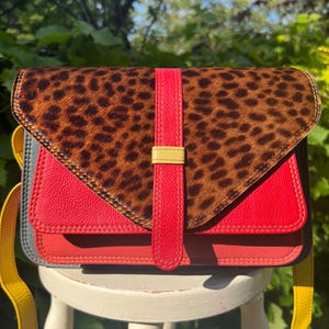 Red, Orange leather/leopard print bag, sustainable recycled leather, Fairtrade, unique shoulder bag, ethically crafted from leather offcuts