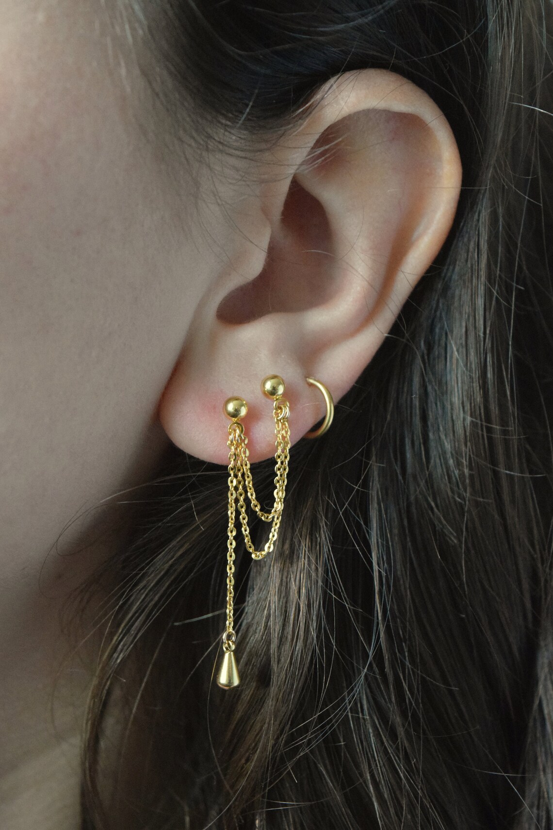 Boucles d'oreilles 2 trous chaîne fine pendante double piercing lobe — free download