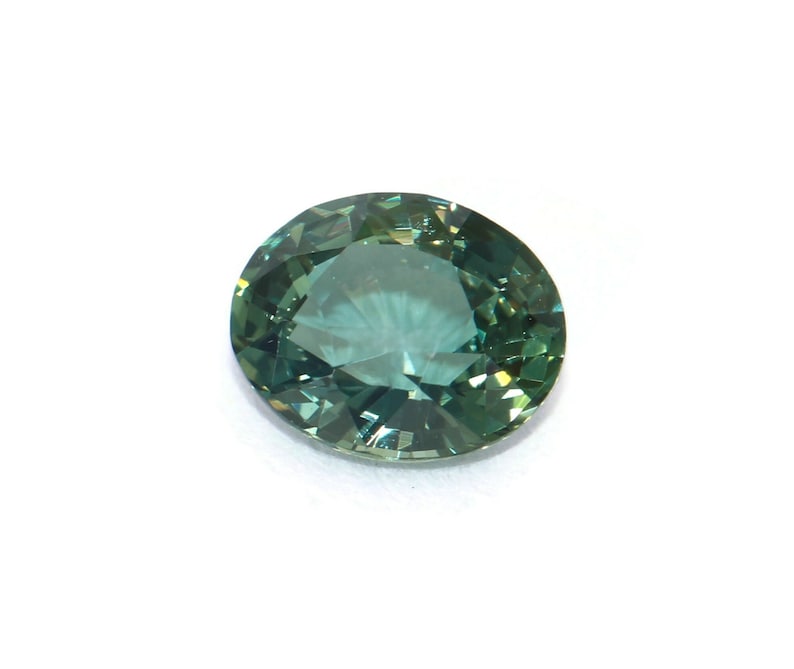 Sold. Reserved for Matthew. 1.19 Carat Oval Teal Green Blue Unheated