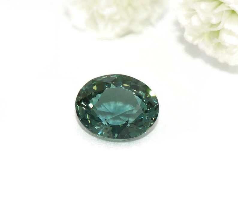 Sold. Reserved for Matthew. 1.19 Carat Oval Teal Green Blue Unheated
