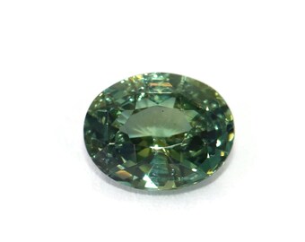 1.65 Carat Oval Teal Sapphire: Unheated Gemstone for Custom Ring
