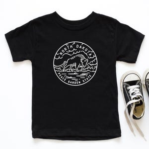 North Dakota State Motto Toddler T-Shirt, Moving To North Dakota Kids Shirt, North Dakota Vacation Souvenir Gift, Fargo Minot Bismarck Shirt