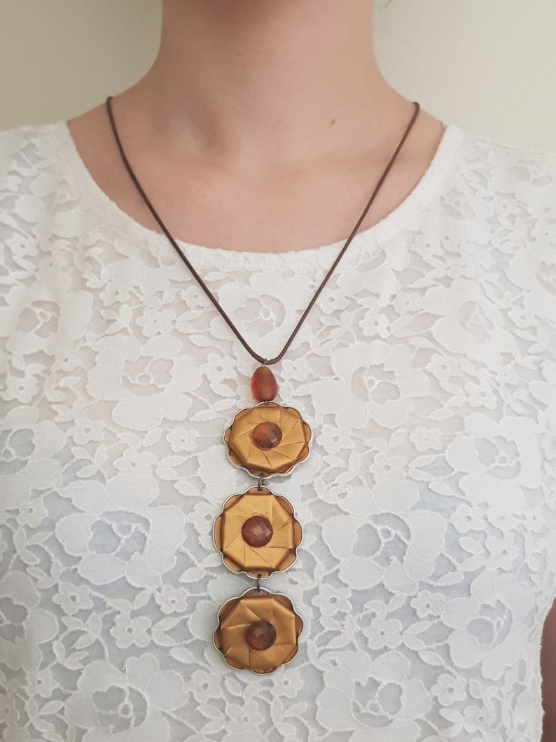 Gold color nespresso capsule necklace