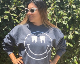 The World Needs Your Smile Crewneck