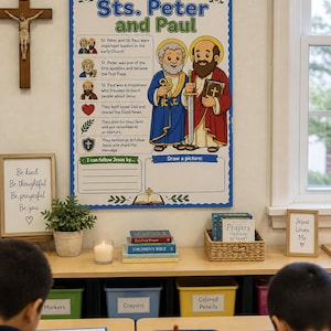 May include: A classroom scene featuring a poster titled "All About Sts. Peter and Paul" with illustrations. Other elements include a wooden crucifix, framed inspirational quotes, books, a candle, and containers labeled "Markers," "Crayons," and "Colored Pencils."
