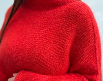 Capelet Sweater (Knitting pattern in German)