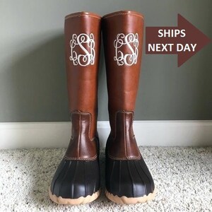 Tall black duck boots sales