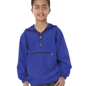 May include: A royal blue hooded jacket with a zipper closure and a zippered pocket on the front. The jacket has a black drawstring hood and black elastic cuffs.