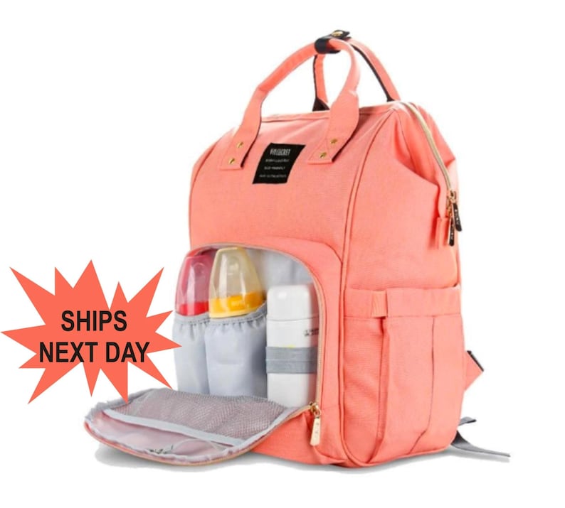 Monogrammed baby diaper bag backpack. Coral diaper bag with baby names or 3 initilas monogram on front.