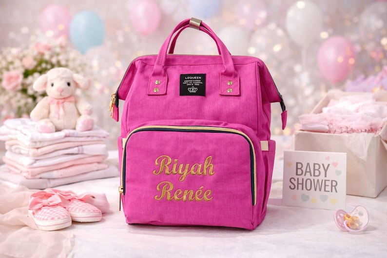 Pink diaper bag with gold thread embroidery