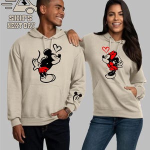 Couple matching hoodie with minnie mouse and Mickley mouse. Couples initials are on sleeve