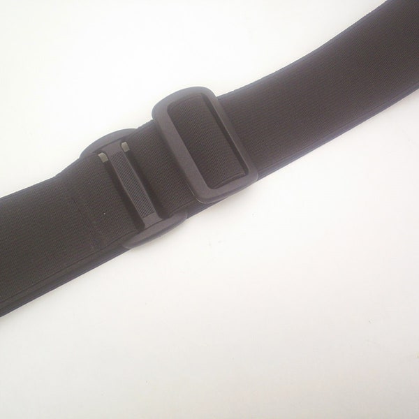 velcro fastening  black elastic belts fully adjustable p v c  slider bar to fit 30 to 44 inch waist