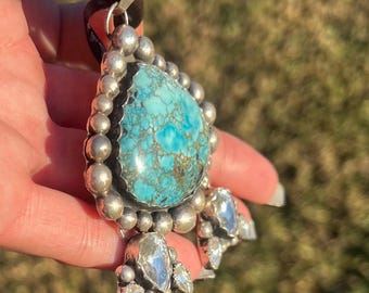 Hand-Crafted Turquoise Pendant with cubic zirconia and Sterling Silver.