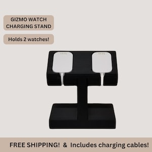 May include: Black charging stand for two smartwatches. The stand has two white charging docks with a black base and a T-shaped support.