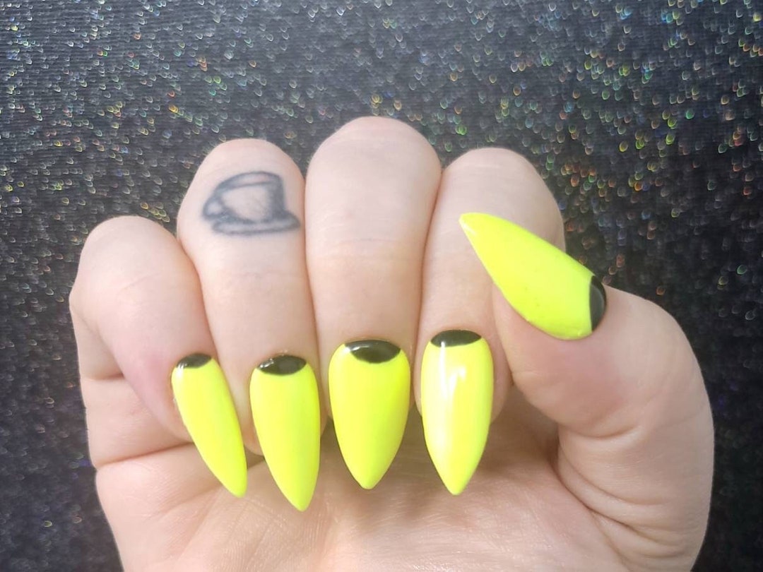 7. Neon Yellow and Glitter Almond Acrylic Nails with Ring Finger Accent - wide 4