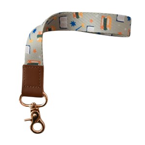 Book Pattern Wristlet | Bookish Key Fob Wristlet with Gold Clasp | Cute Accessories for Book Lovers and Librarians