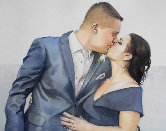 May include: A watercolor painting of a couple kissing. The man is wearing a blue suit and the woman is wearing a white dress with floral print. The painting is done in a romantic style.