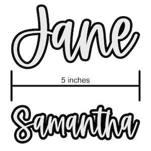 May include: White cursive text names "Jane" and "Samantha" with black outlines. A black line indicates a 5-inch measurement. The names are in a script font, suitable for personalized gifts or decor.