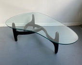 Mid century floating glass organic coffee table in ebony