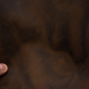 Crazy horse leather sheet in chocolate brown. Very strong oil tanned pull up leather panels