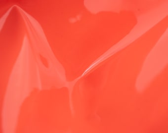 Patent leather pieces in  salmon pink for diy crafts. Glossy varnished leather peices