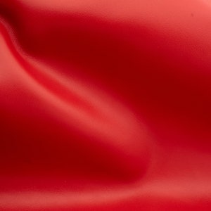 Nappa leather sheets in  red color. Good quality genuine  leather sheet in carmine red color for DIY  and leather crafts