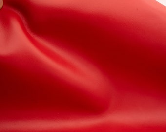 Nappa leather sheets in  red color. Good quality genuine  leather sheet in carmine red color for DIY  and leather crafts