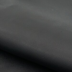 1.1mm/ 2oz black Saffiano leather sheet. Strong, fashionable, easy to clean, waterproof genuine leather great for wallets and bags