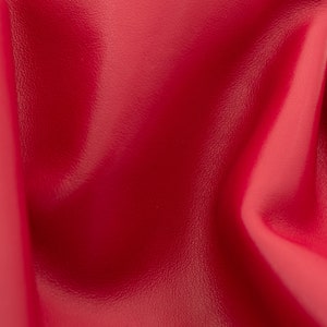 Nappa leather sheets in crimson red color. Good quality genuine  leather sheet in carmine red color for DIY  and leather crafts