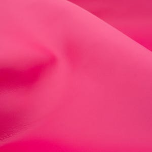 Leather sheets in  magenta pink color. Genuine  leather panels in very bright pink for DIY  and leather crafts