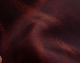 Crazy horse leather sheets in dark red bordeaux color. Pull up, antiqued full grain leather pieces