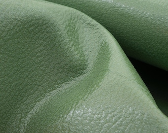 Glossy leather sheets in light sage green. Genuine leather pieces in mint color