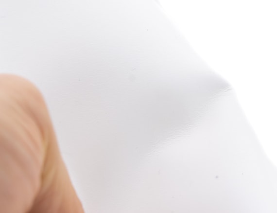 Pure white smooth leather sheets. Genuine leather pieces with clean surface