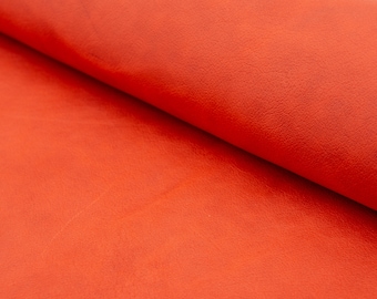 Semi veg tan leather sheets in dark salmon pink color. Rustic semi veg tan leather pieces in dark salmon color