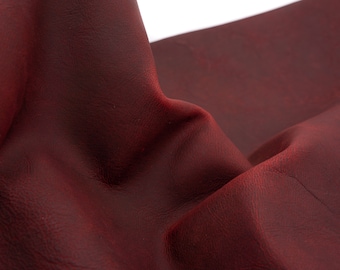 Dark bordeaux red pull up, crazy horse leather sheets. Distress, full grain, vintage look, semi veg tan leather pieces in wine red color