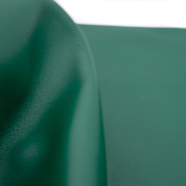 Green nappa leather sheets. Soft smooth genuine leather pieces in matte forest green color for diy crafts