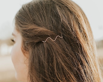 Minimalistische dunne golvende gouden haarspeld haarclip