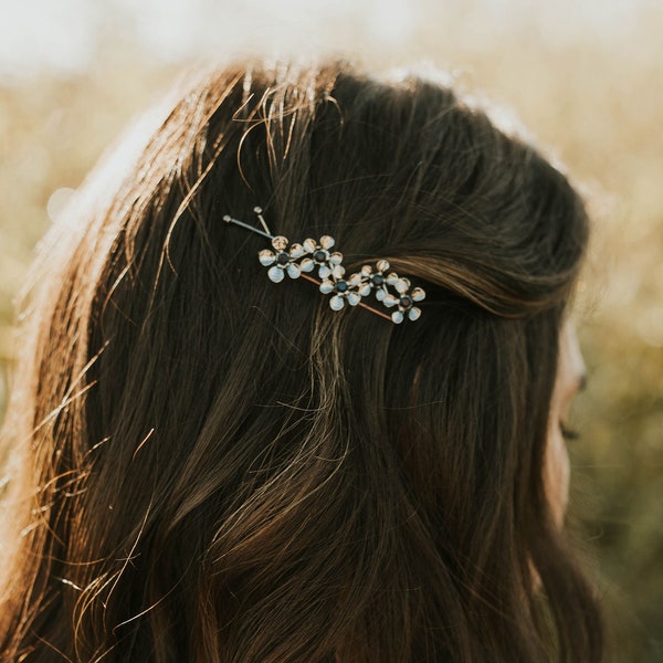 Dainty flower hair pin for side-parted hair style