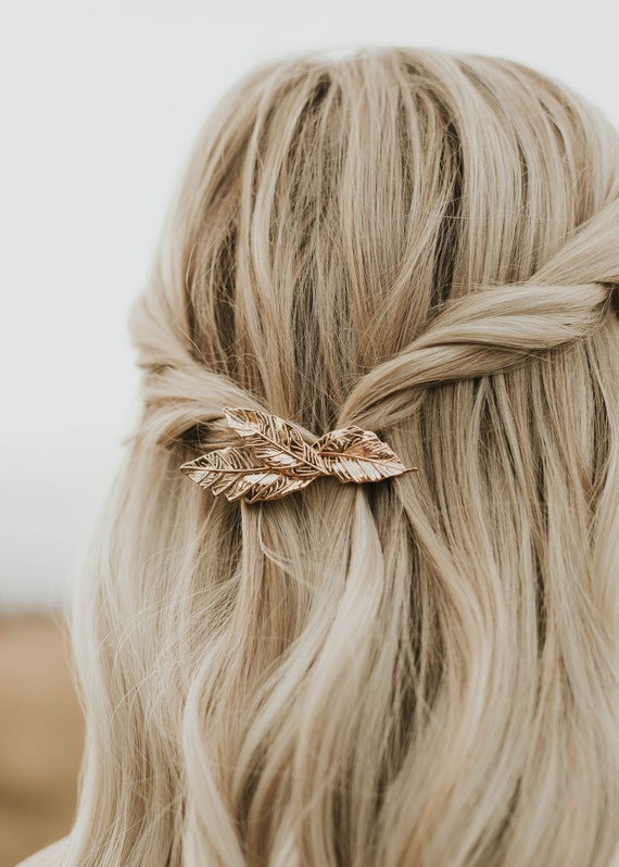 Image of Half up half down hairstyle with a barrette for picture day