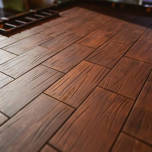 Puede incluir: Primer plano de un suelo de madera con un patrón de espiga. El suelo está hecho de tablones de madera marrón oscuro con veta natural.