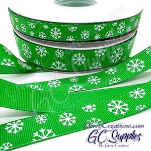 Snowflakes - Emerald Green - USDR Grosgrain Ribbon 5/8” & 3/8” White Ink and Iridescent Glitter Snowflakes scattered on emerald Green