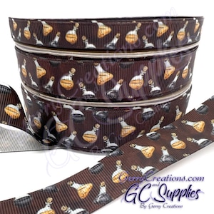 May include: Brown ribbon with a repeating pattern of potion bottles and cauldrons. The ribbon is layered and has a white background. The text "Gerry Creations.com and GC Supplies By Gerry Creations" is printed on the ribbon.