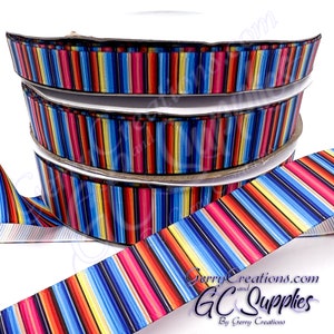 May include: Multicolored striped ribbon with red, yellow, blue, and black stripes. The ribbon is folded in a stack of three. The ribbon is available in various widths.