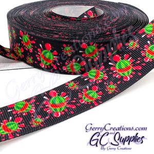 May include: A roll of black grosgrain ribbon featuring a repeating pattern of green watermelons with red accents. The ribbon is printed with a watermelon design and is suitable for crafting and gift wrapping.