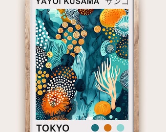 May include: A framed art print featuring a colorful abstract design with the text "YAYOI KUSAMA" and "TOKYO". The artwork showcases a mix of teal, orange, and white organic shapes, resembling coral or underwater elements. The frame is made of light-colored wood.