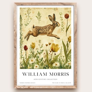 May include: A framed print featuring a leaping hare amidst a field of yellow and red tulips and daisies. The artwork, in a vintage style, includes the text "WILLIAM MORRIS" and "19TH CENTURY COLLECTION". The print is in a wooden frame.