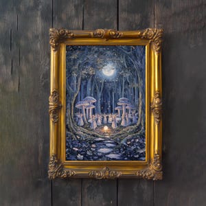 May include: A framed painting shows a moonlit forest scene with figures in white dresses dancing near large mushrooms. The artwork is set in a gold ornate frame, against a dark wood background.